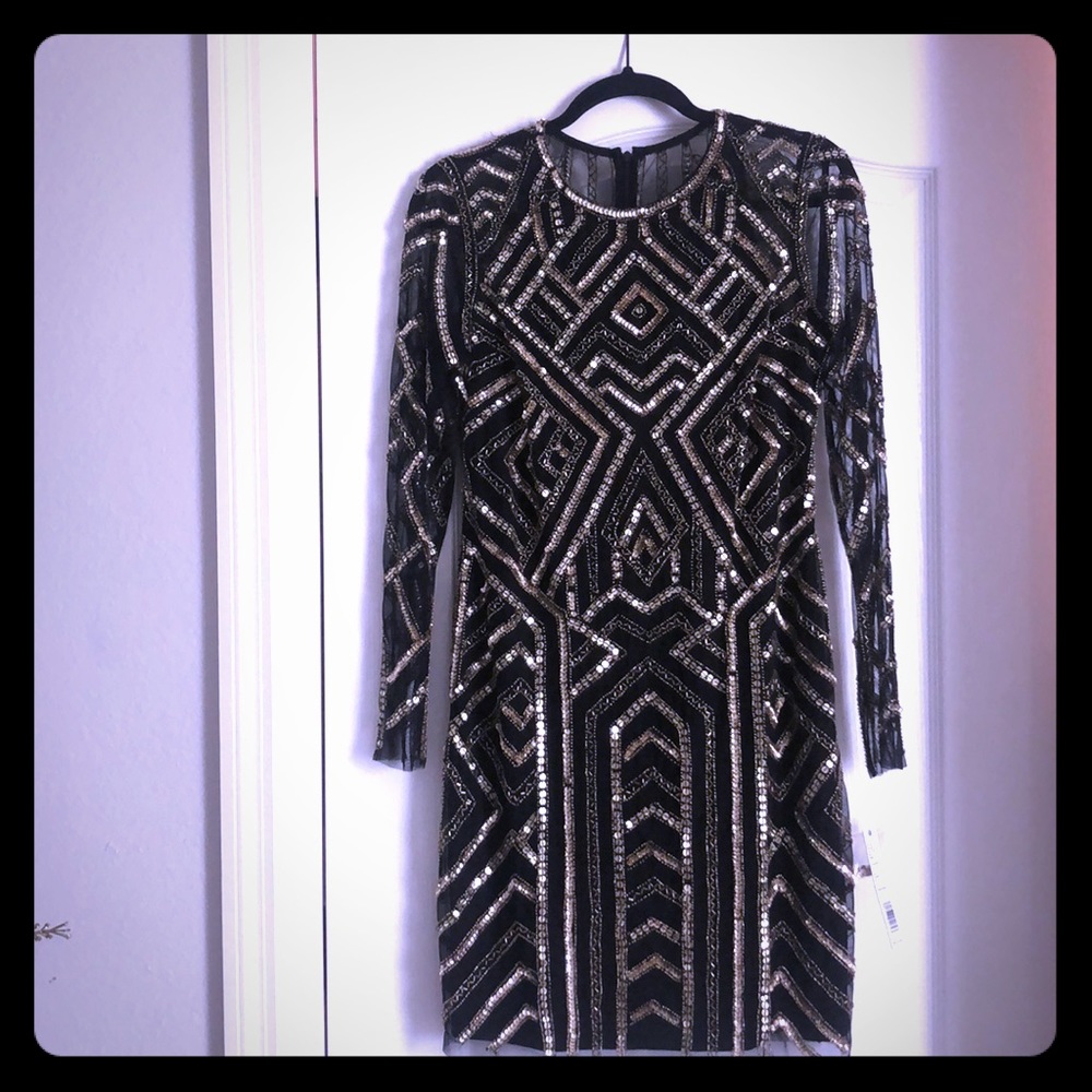 Sequin cocktail dress black and Gold :Gianni Bini